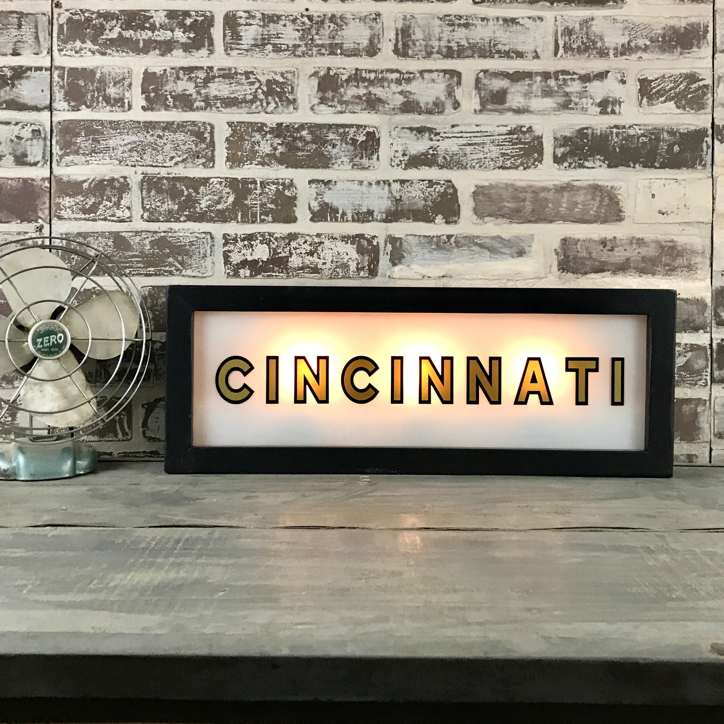Black & Gold Lighted Sign