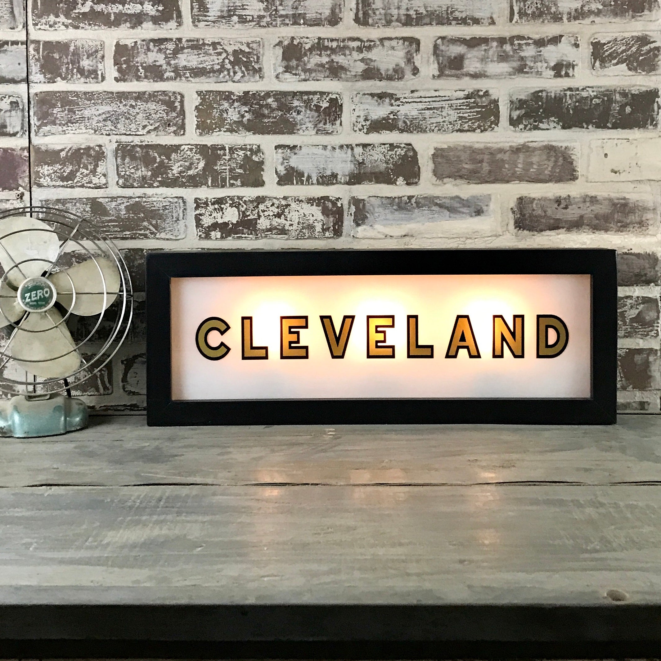 Black & Gold Lighted Sign